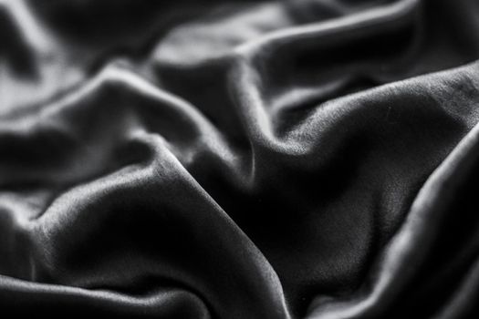 Fashion brand, elegant fabric and luxe beauty concept - Luxury black soft silk flatlay background texture, holiday glamour abstract backdrop