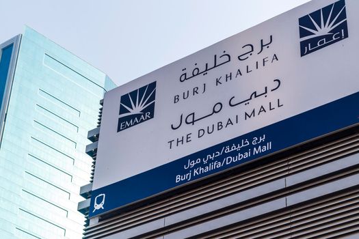 Dubai, UAE - 08.16.2021 - Sign board of Dubai Mall, Burj Khalifa metro station
