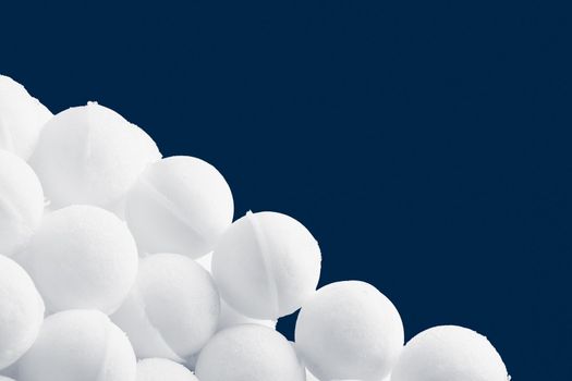 snowballs heap part, blue copy-space background