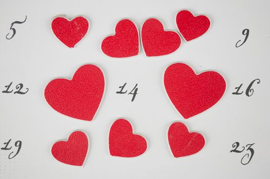 Calendar page with the red hearts on February 14 of Saint Valentines day.