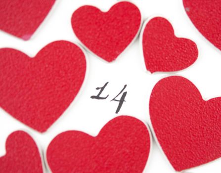 Calendar page with the red hearts on February 14 of Saint Valentines day.