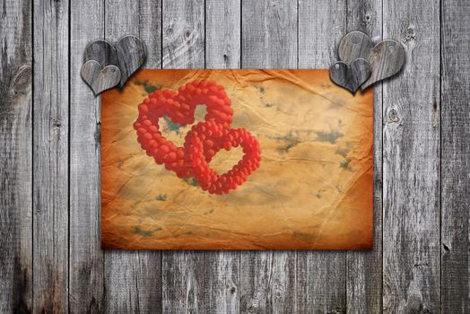 heart shaped red balloons on old wooden background