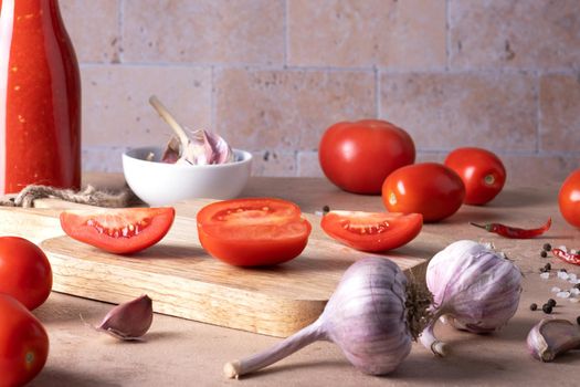 Ingredients for making homemade tomato sauce. Selective focus.