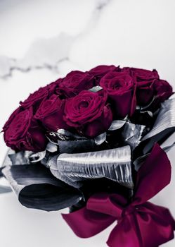 Gift for her, romantic relationship and floral design concept - Luxury bouquet of maroon roses on marble background, beautiful flowers as holiday love present on Valentines Day