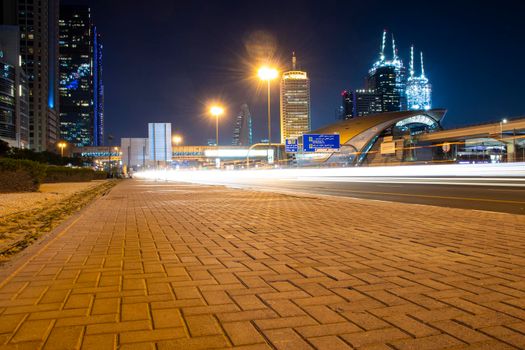 Main road of a United Arab Emirates, Shekh Zayed road. Shot taken in Dubai. Many of famous landmarks such World trade center, Etisalat telecom company head quarters, Zabeel one building under construction can be seen as well as metro station. Outdoors