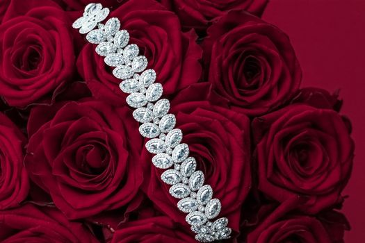 Luxe branding, glamour fashion and boutique shopping concept - Luxury diamond jewelry bracelet and red roses flowers, love gift on Valentines Day and jewellery brand holiday background design