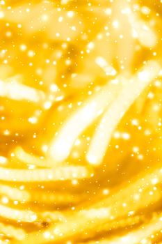 Golden Christmas lights, New Years Eve fireworks and abstract texture concept - Glamorous gold shiny glow and glitter, luxury holiday background