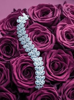 Luxe branding, glamour fashion and boutique shopping concept - Luxury diamond jewelry bracelet and pink roses flowers, love gift on Valentines Day and jewellery brand holiday background design