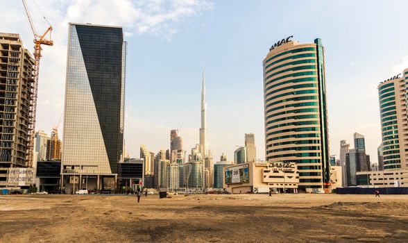 Dubai, UAE - 01.19.2021 - Burj Khalifa, tallest building in the world surrounded by other modern buildings