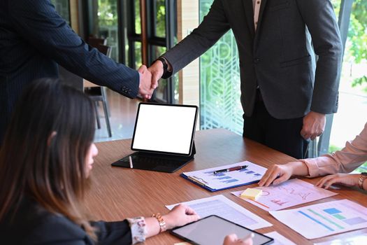 Business people handshake for successful of investment deal.