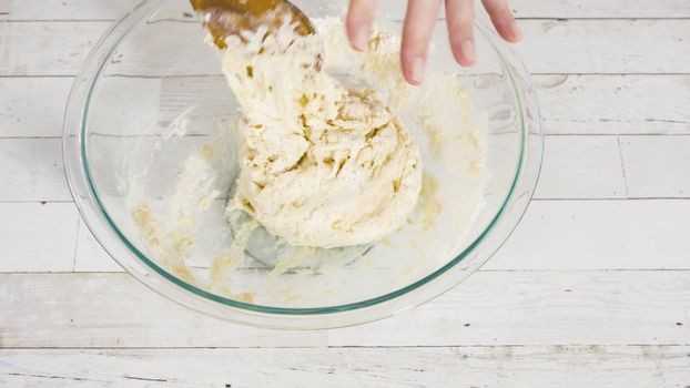 Preparing homemade pizza dough from all-purpose flour.