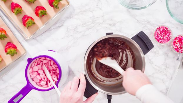 Flat lay. Step by step. Melting chocolate chips in chocolate melting pots.