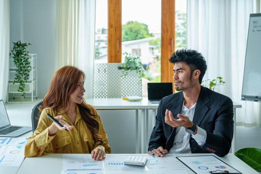 Portrait of a female business owner and partner company meeting to collaborate to invest in imported goods, plan to increase marketing profits using budget documents and working calculator.