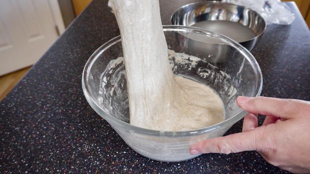 Step by step. Baking sourdough bread in residential kitchen.
