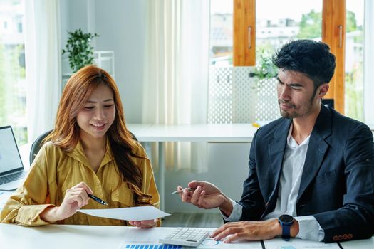 Portrait of a female business owner and partner company meeting to collaborate to invest in imported goods, plan to increase marketing profits using budget documents and working calculator.
