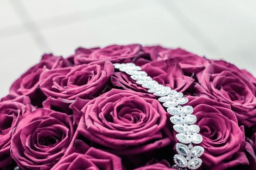 Luxe branding, glamour fashion and boutique shopping concept - Luxury diamond jewelry bracelet and pink roses flowers, love gift on Valentines Day and jewellery brand holiday background design