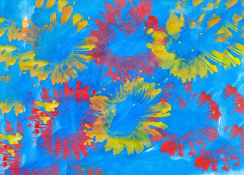 Illustration made by child of painted firework on blue background