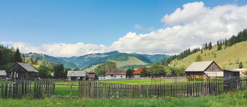 beautiful farmstead in the valley with blue sky. High quality photo