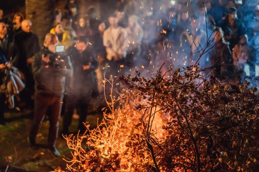 Montenegro, Budva 7.01. 2021: Christian Christmas in Montenegro, the feast of the oak branch. People burn an oak branch in honor of Christmas.