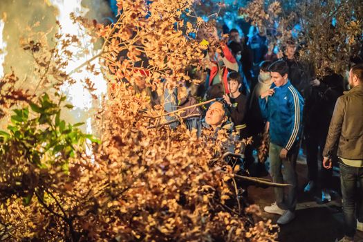 Montenegro, Budva 7.01. 2021: Christian Christmas in Montenegro, the feast of the oak branch. People burn an oak branch in honor of Christmas.