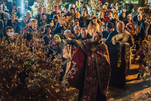 Montenegro, Budva 7.01. 2021: Christian Christmas in Montenegro, the feast of the oak branch. People burn an oak branch in honor of Christmas.