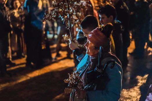 Montenegro, Budva 7.01. 2021: Christian Christmas in Montenegro, the feast of the oak branch. People burn an oak branch in honor of Christmas.