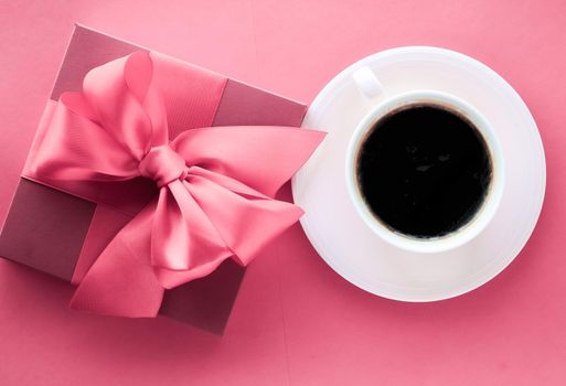 French chic, Valentines Day present and beauty drink concept - Luxury gift box and coffee cup on pink background, flatlay design for romantic holiday morning surprise