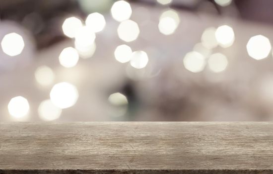 Rustic wooden table on room with bokeh blurred background. assembly, product display exhibition.