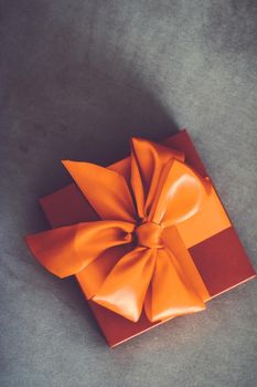 Birthday present, shop sale promotion and autumn decoration concept - Vintage luxury holiday orange gift box with silk ribbon and bow, christmas or valentines day decor