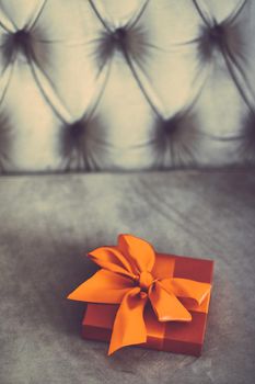 Birthday present, shop sale promotion and autumn decoration concept - Vintage luxury holiday orange gift box with silk ribbon and bow, christmas or valentines day decor