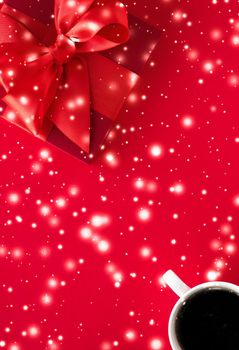 Hot drink, luxury festive menu and Valentines Day card concept - Winter holiday gift box, coffee cup and glowing snow on red flatlay background, Christmas time present surprise