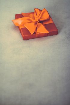 Birthday present, shop sale promotion and autumn decoration concept - Vintage luxury holiday orange gift box with silk ribbon and bow, christmas or valentines day decor