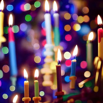 Image of jewish holiday Hanukkah background with menorah and burning candles.