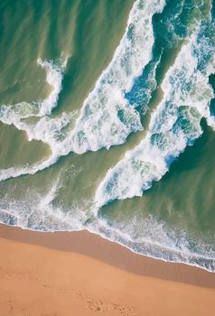 Beach and waves from above. water background from the top. Summer attacks from the air. Aerial view of a blue ocean.