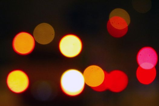 Blurred background, out of focus. Background of city traffic lights. City lighting