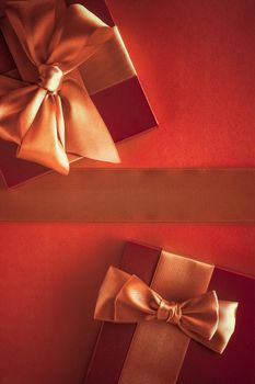 Glamour celebration, wrapped luxe boxes and shopping sale concept - Luxury gifts with golden bow as holiday background, Valentines Day presents surprise