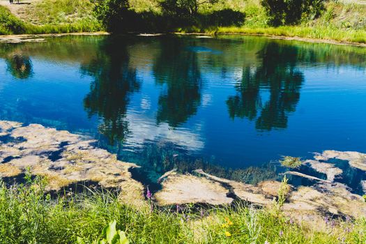 Lake with gray water. Blue lake in Samara region in Russia. Deep pond. Smell of hydrogen sulfide.