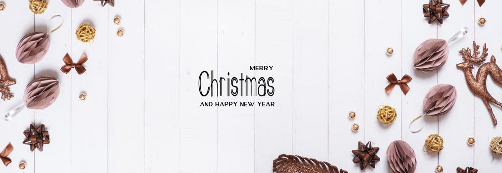 Merrry Christmas and Happy new year greeting card with composition flat lay on wooden background.