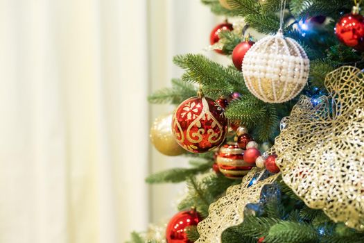 Close up of balls on christmas tree. background New Year concept