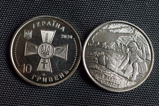 Ukrainian coins - war period limited edition 2020. Translation - Ukraine, ten hryvnia, on guard of life. High quality photo