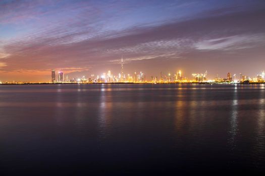Shot of a Dubai city skyline at night from Dubai creek harbour. UAE.