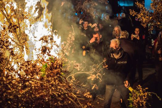 Montenegro, Budva 7.01. 2021: Christian Christmas in Montenegro, the feast of the oak branch. People burn an oak branch in honor of Christmas.