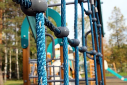 Children's playground with sports equipment in the city park. The concept of a healthy lifestyle.