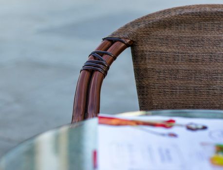 Close up shot of outdoors wicker furniture