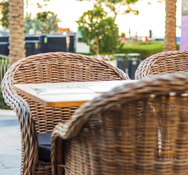 Close up shot of outdoors wicker furniture