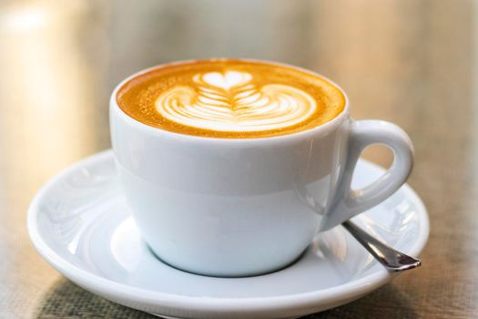Close up shot of a cup of cappuccino