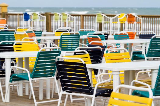 Empty patio with multi color chair.