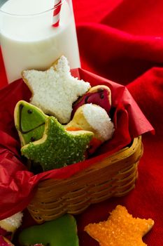 Assorted christmas cookies on red background.