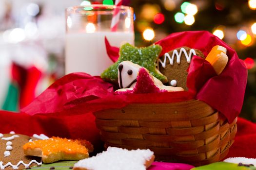 Assorted christmas cookies on red background.