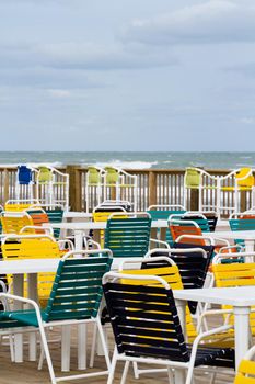 Empty patio with multi color chair.